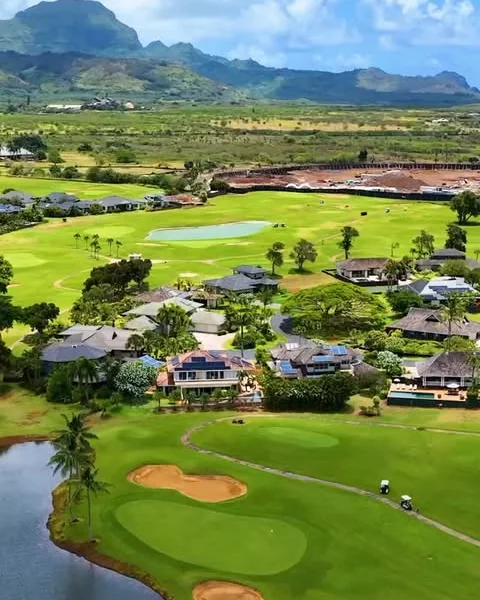 A Kauai golf course below the mountains, from the air