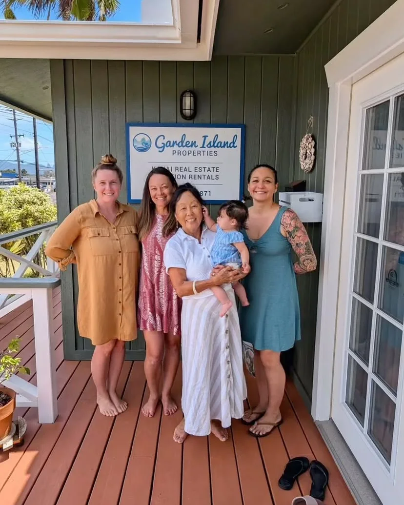 The Garden Island Properties family outside their Kapaa office